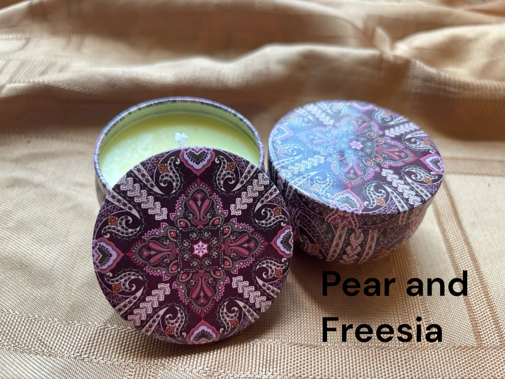 Pear and Freesia plant scented mosaic candle encassed in a stunning vibrant tin. It blends striking visual artistry with a premium fragrance experience! 