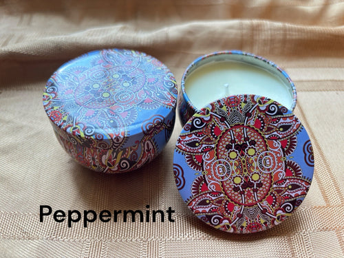 Peppermint scented mosaic candle encassed in a stunning vibrant tin. It blends striking visual artistry with a premium fragrance experience! 