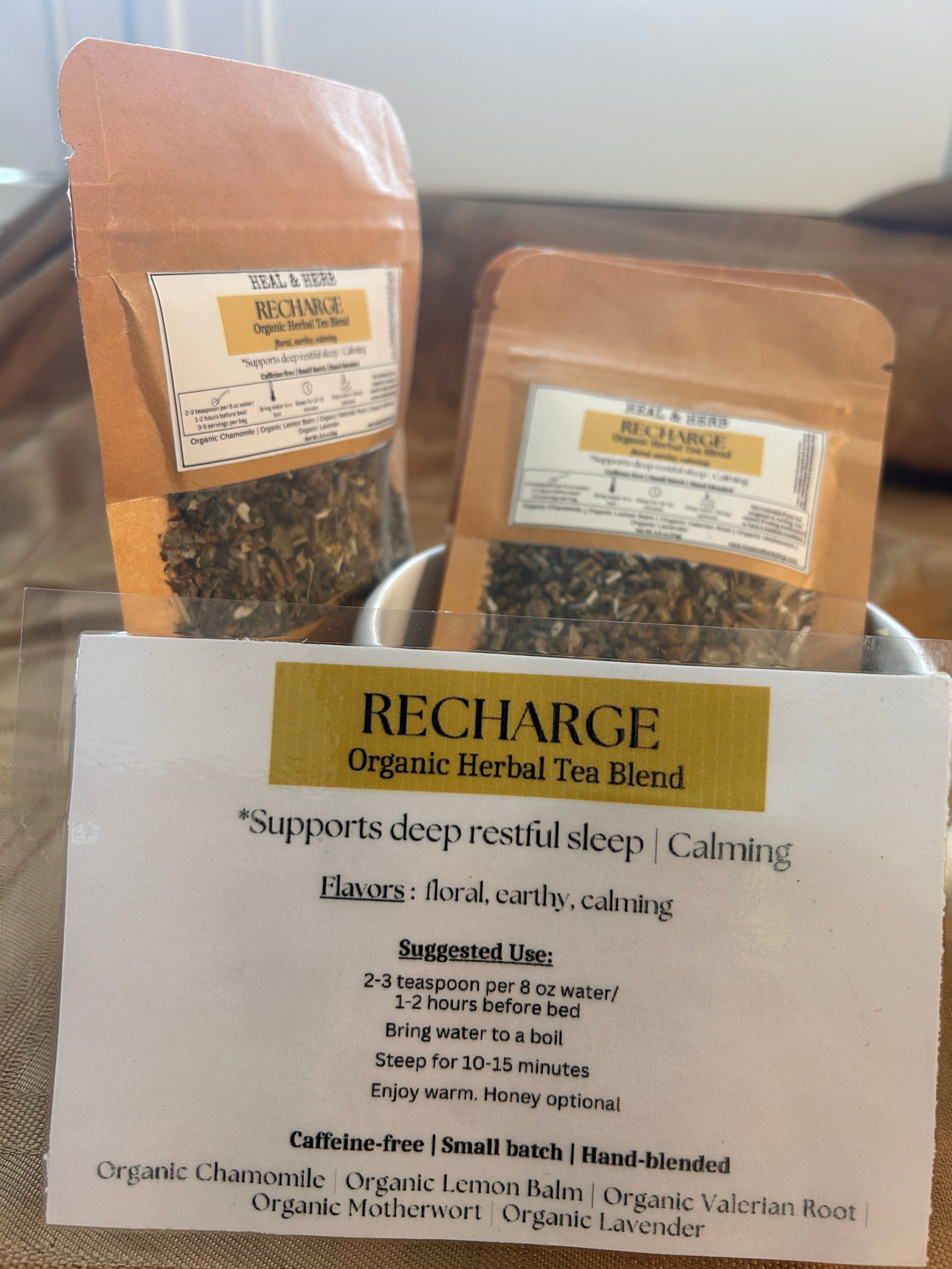 Our RECHARGE Organic Herbal Tea blend is crafted to support deep, restful sleep by calming the mind, easing tension, and helping the body fully unwind. This gentle nighttime tea is perfect for creating a peaceful evening ritual that promotes rest without morning grogginess.

Chamomile and lemon balm offer soothing floral notes, while motherwort and valerian root provide grounding relaxation. Lavender ties it all together with a soft, fragrant finish—ideal for sipping 1–2 hours before bed as you prepare to r