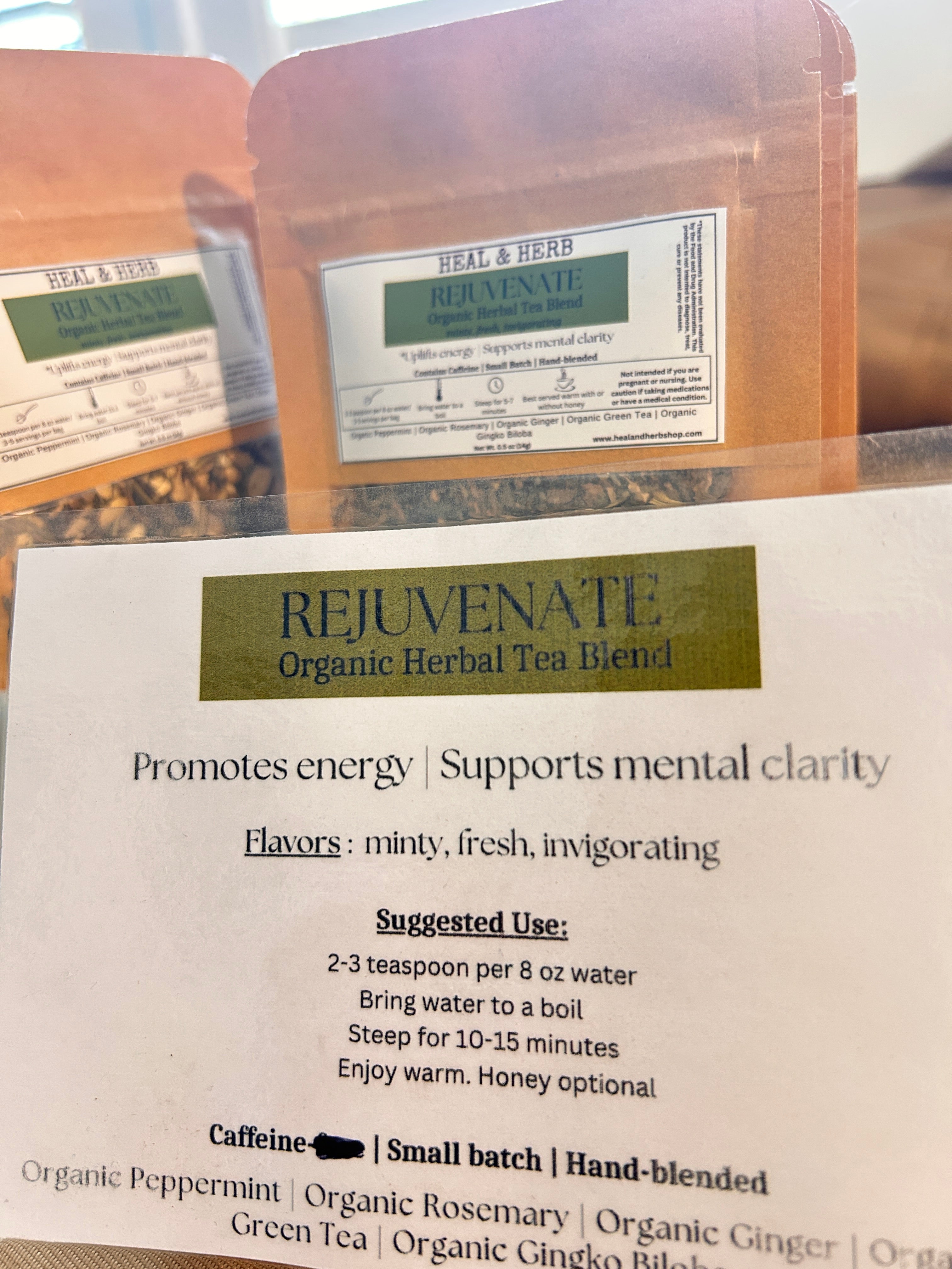 Our REJUVENATE Organic Herbal Tea blend is crafted to awaken the mind and uplift the body—formulated to support natural energy, focus, and mental clarity without the crash. Perfect for slow mornings or that mid-afternoon slump when you need a gentle boost.

Peppermint and ginger offer a refreshing, invigorating base, while rosemary and gingko biloba are traditionally used to support cognitive clarity and circulation. A touch of green tea provides a mild dose of caffeine for sustained alertness, creating a c