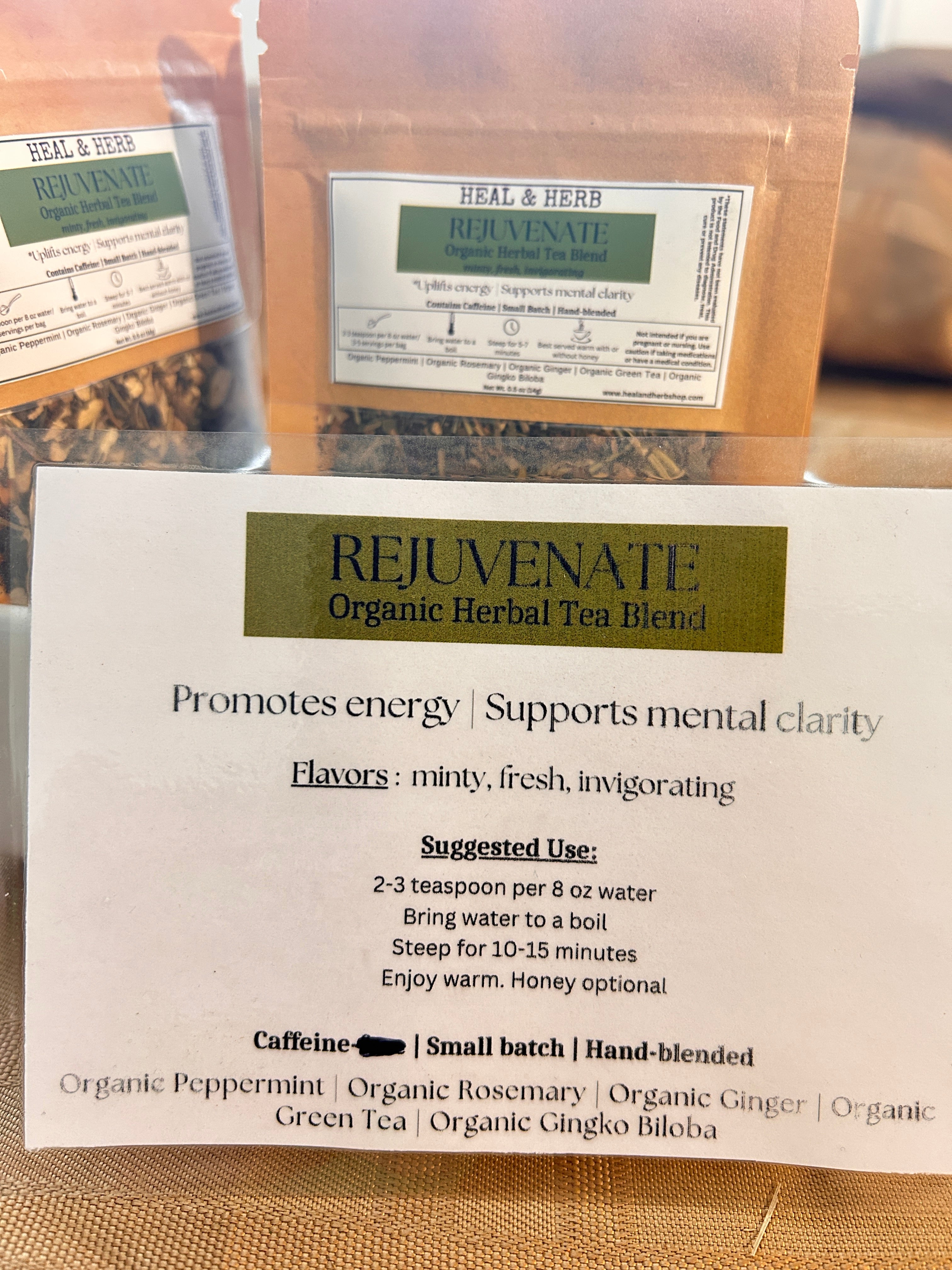 Our REJUVENATE Organic Herbal Tea blend is crafted to awaken the mind and uplift the body—formulated to support natural energy, focus, and mental clarity without the crash. Perfect for slow mornings or that mid-afternoon slump when you need a gentle boost.

Peppermint and ginger offer a refreshing, invigorating base, while rosemary and gingko biloba are traditionally used to support cognitive clarity and circulation. A touch of green tea provides a mild dose of caffeine for sustained alertness, creating a c