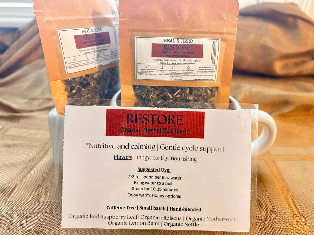 Our RESTORE Organic Herbal Tea blend is a calming and nourishing mix formulated to support women's health, ease PMS discomfort, and promote balance throughout the menstrual cycle. Perfect for grounding the body and mind during that time of the month.

Hibiscus and lemon balm bring a bright, floral flavor and gentle relaxation, while motherwort and raspberry leaf have been traditionally used to support the uterus. Nettle adds a rich source of minerals, helping to replenish and restore.

Caffeine-free | Small