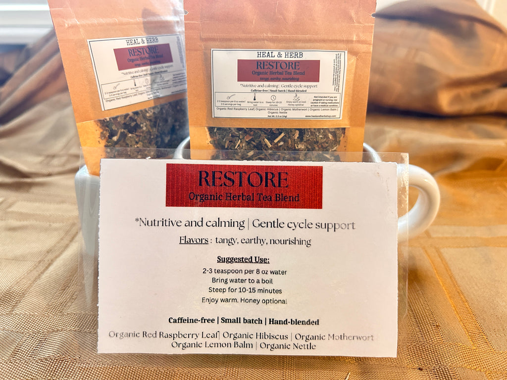 Our RESTORE Organic Herbal Tea blend is a calming and nourishing mix formulated to support women's health, ease PMS discomfort, and promote balance throughout the menstrual cycle. Perfect for grounding the body and mind during that time of the month.

Hibiscus and lemon balm bring a bright, floral flavor and gentle relaxation, while motherwort and raspberry leaf have been traditionally used to support the uterus. Nettle adds a rich source of minerals, helping to replenish and restore.

Caffeine-free | Small