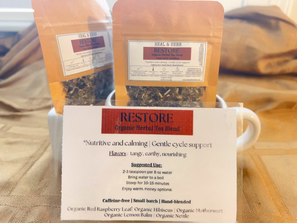 Our RESTORE Organic Herbal Tea blend is a calming and nourishing mix formulated to support women's health, ease PMS discomfort, and promote balance throughout the menstrual cycle. Perfect for grounding the body and mind during that time of the month.

Hibiscus and lemon balm bring a bright, floral flavor and gentle relaxation, while motherwort and raspberry leaf have been traditionally used to support the uterus. Nettle adds a rich source of minerals, helping to replenish and restore.

Caffeine-free | Small